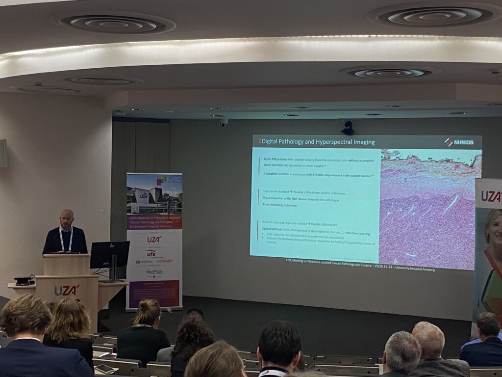 Fabrizio Preda is talking to the audience about Digital Pathology and Hyperspectral Imaging in the auditorium of the University Hospital Antwerp (UZA).